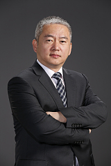 Mr. Xiaoguang Wang